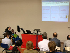 COGAIN 2007 End User session, Michael Cubiss giving presentation by using an eye tracker