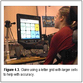 Figure 4.3. Claire using a letter grid with larger cells to help with accuracy.
